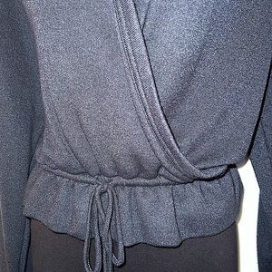 Charcoal peplum top. NWOT